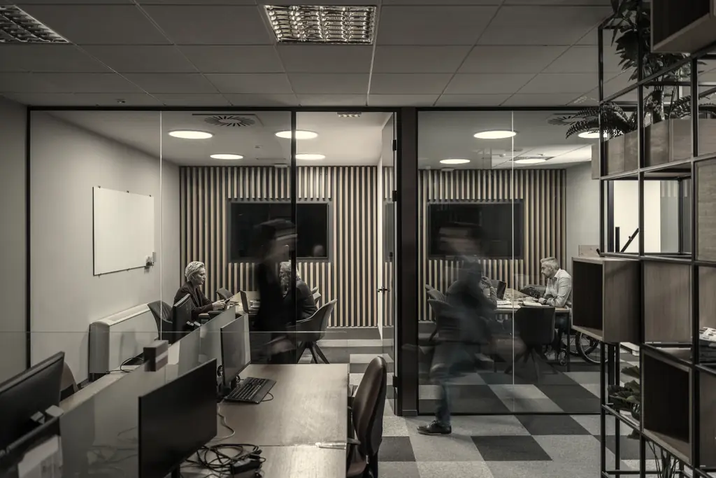 People working in a modern office, illustrating business sales and commercial legal advice